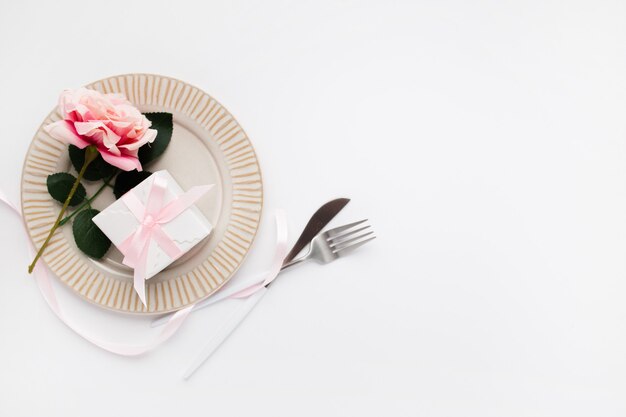 Beautiful top view table setting for Valentines on white
