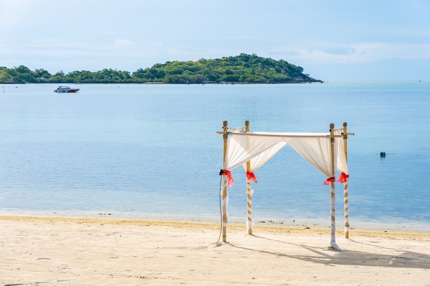 Beautiful tropical beach with wedding arch