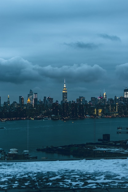 Beautiful Urban City with Amazing Clouds in the Sky on the Background