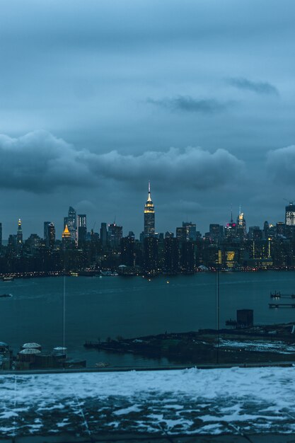 Beautiful urban city with amazing clouds in the sky on the background