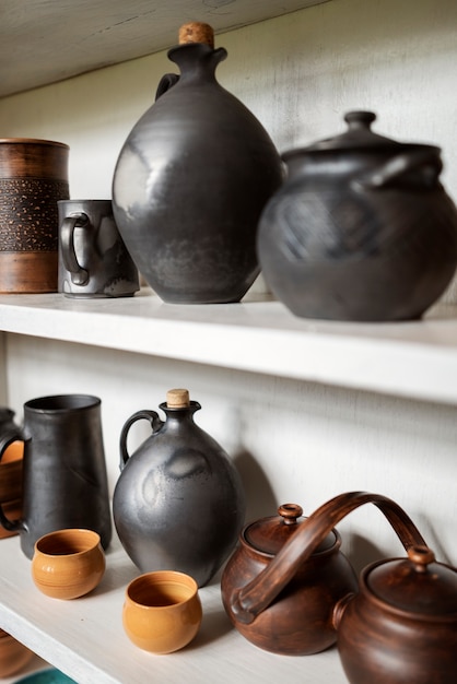 Beautiful vessels on shelves arrangement