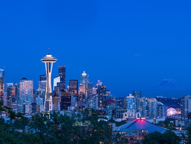 Beautiful view of the city of Seattle, USA with the colorful lighted buildings at dusk