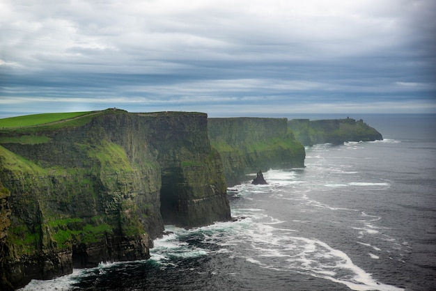Beautiful view of the cliffs of Moher in Ireland on a gloomy day