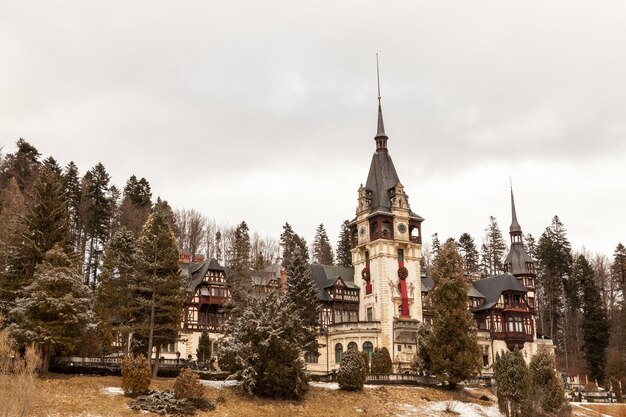 Beautiful view of Peles castle from Sinaia in winter. Romania. Mediaval castle