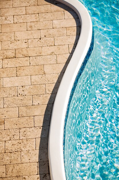 Beautiful view of stone tiles and swimming pool