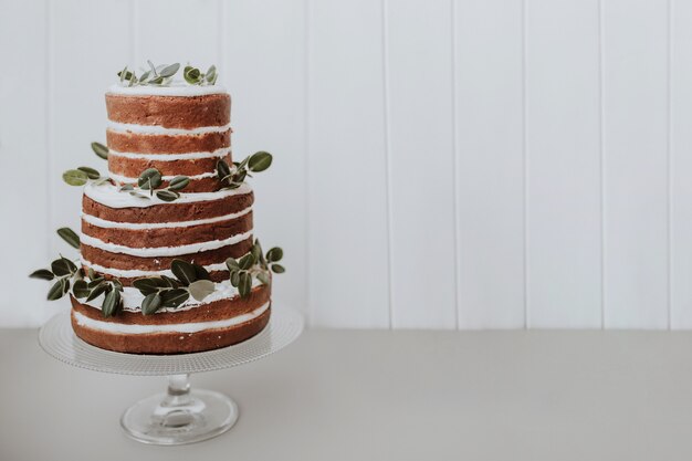 Beautiful wedding cake on white background with space to the right