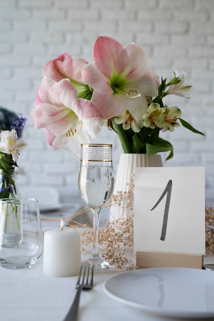 Beautiful wedding table arrangement with flower vase