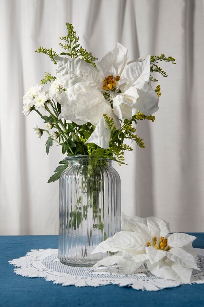 Free photo beautiful white poinsettia arrangement