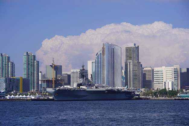 Beautiful wide shot of the skyline of San Diego downtown with amazing large clouds 