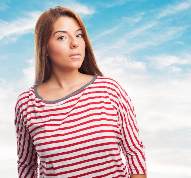 Free photo beautiful woman against a background of sky