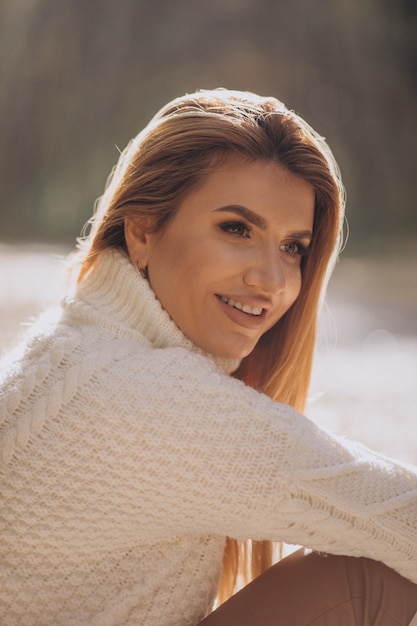 Beautiful woman in an autumn park