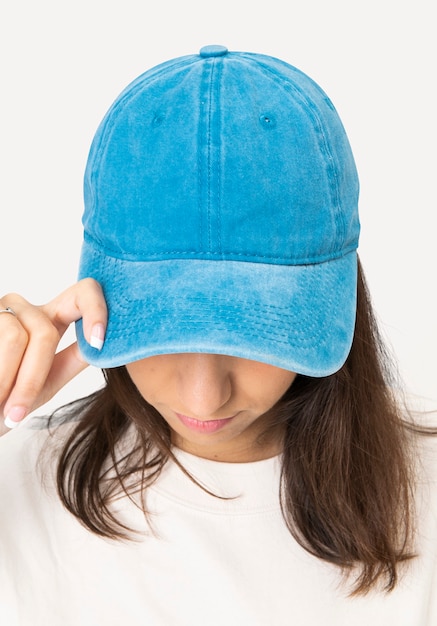 Free photo beautiful woman in baseball cap, headband fashion studio shoot
