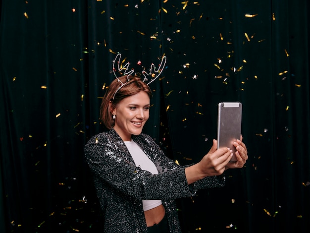 Beautiful woman celebrating new year's eve