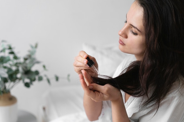 Beautiful woman doing a self care treatment