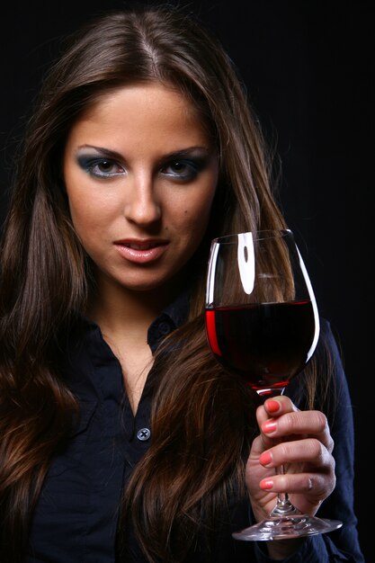 Beautiful woman drinkink wine