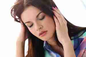 Free photo beautiful woman has headache