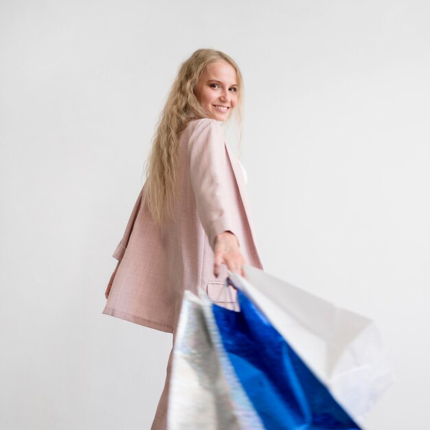 Beautiful woman holding shopping bags