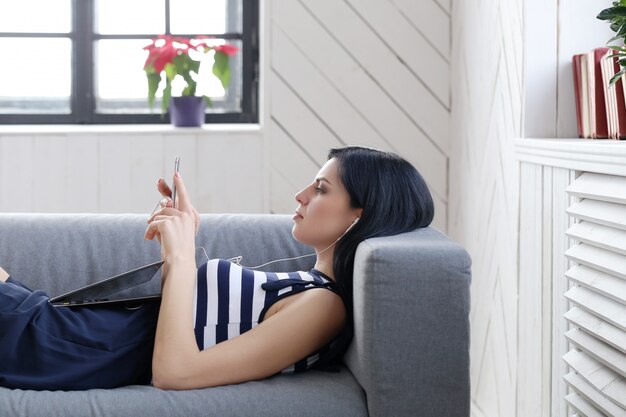 Beautiful woman listening to music