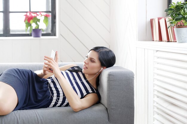 Beautiful woman listening to music