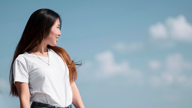 Beautiful woman looking away with copy space