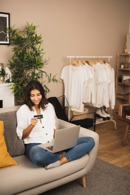 Beautiful woman looking at a card