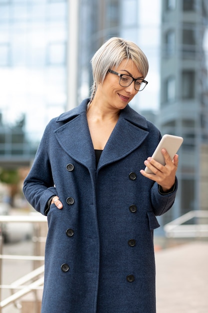 Beautiful woman looking at mobile