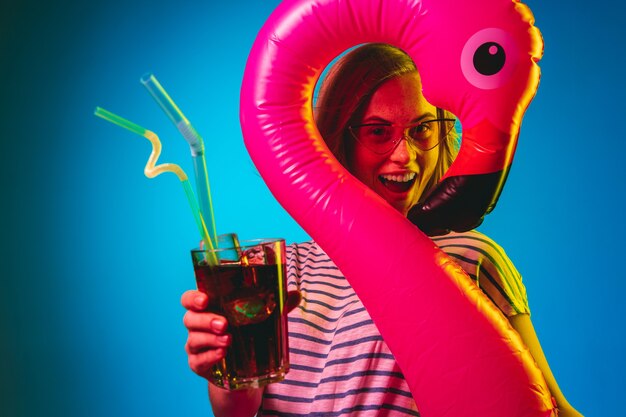 Beautiful woman in neon light isolated 