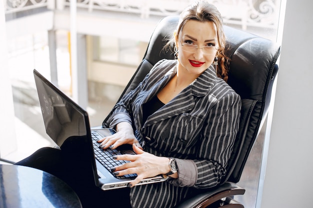 Beautiful woman in a office room