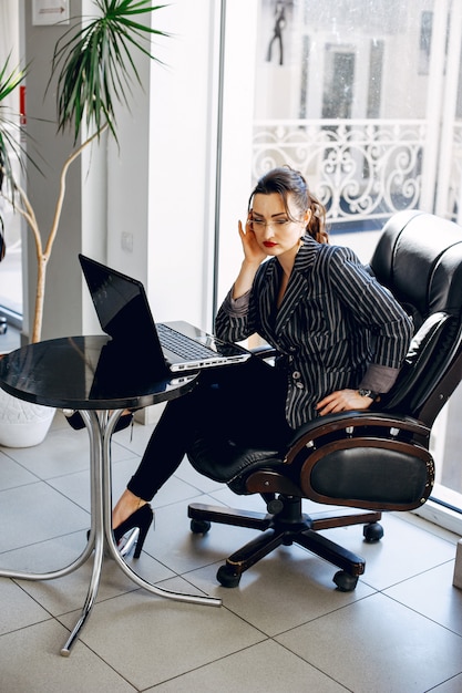 Beautiful woman in a office room