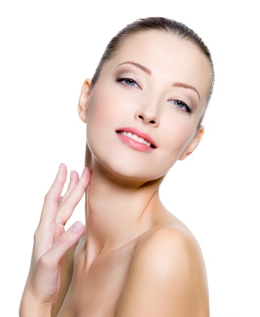 Beautiful woman pampering the neck  - on white background. Profile portrait.