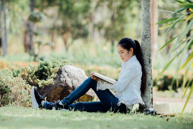 Beautiful woman reading book