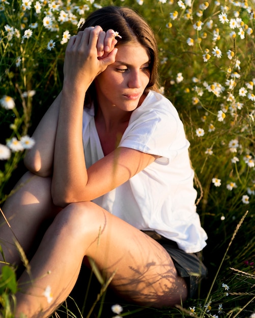 Free photo beautiful woman relaxing in nature