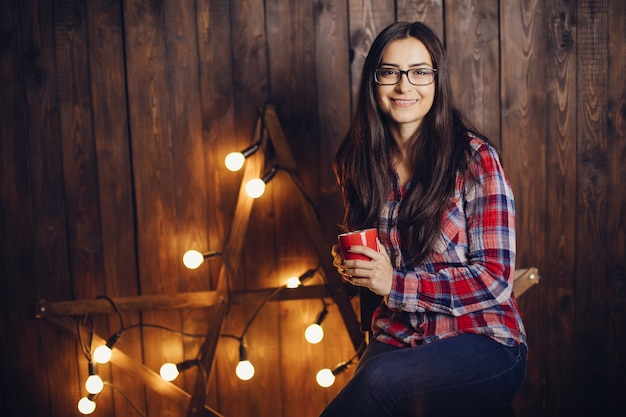 beautiful woman sitting on a chair