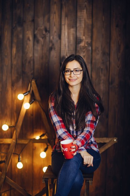 beautiful woman sitting on a chair