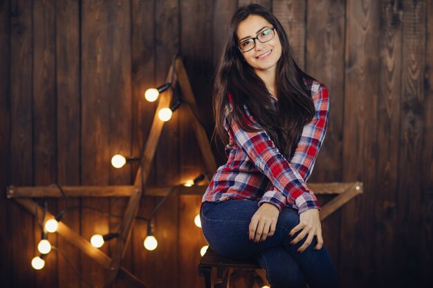 beautiful woman sitting on a chair