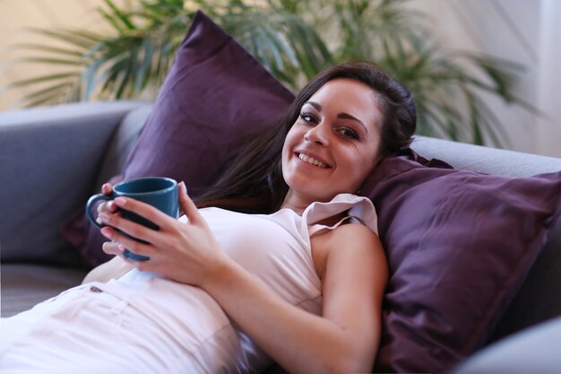 Beautiful woman on the sofa