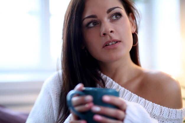 Beautiful woman on the sofa