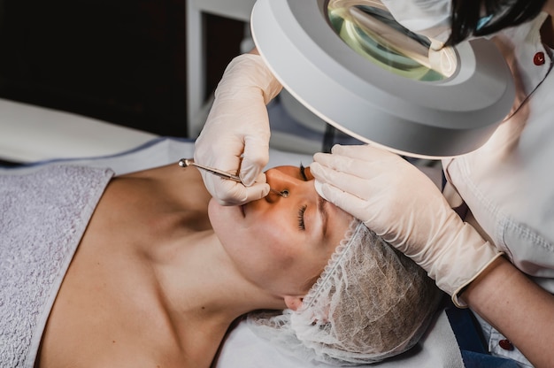 Beautiful woman at the spa during a skin treatment