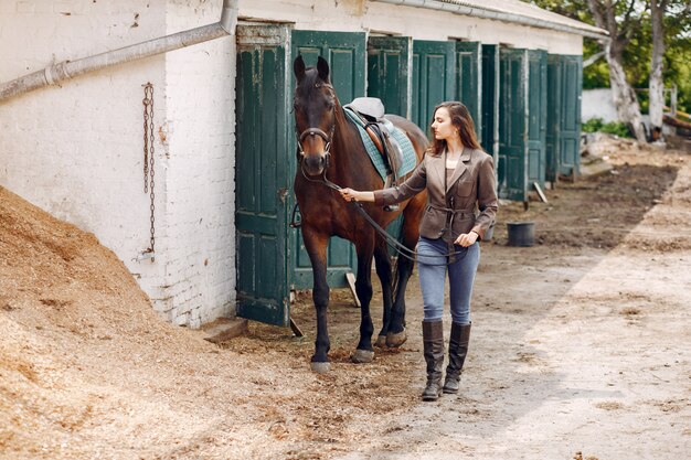 Beautiful woman spend time with a horse