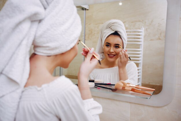 Beautiful woman standing in a bathroom