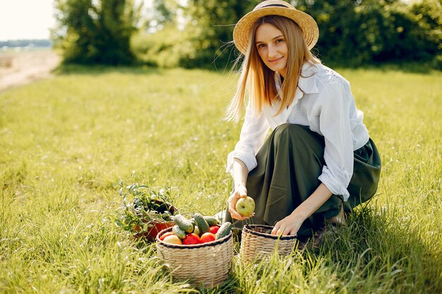 Beautiful woman in a summer field