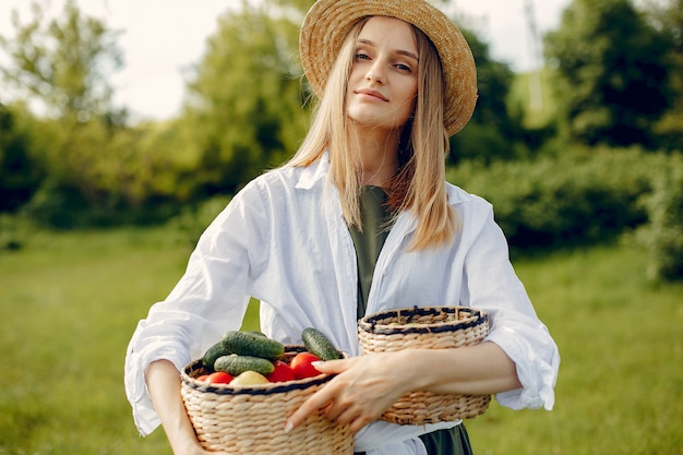 Free photo beautiful woman in a summer field