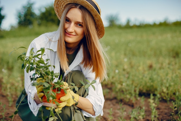 Beautiful woman in a summer field