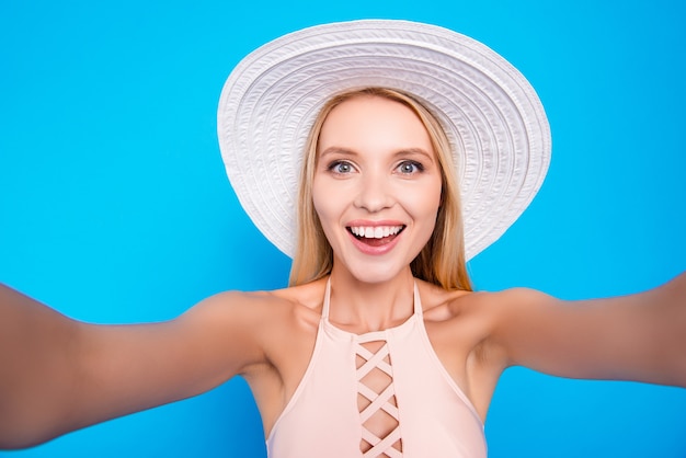 Premium Photo Beautiful Woman Taking Selfie In A Bikini With Hat