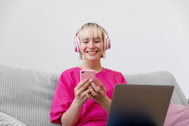 Beautiful woman taking a selfie while working from home