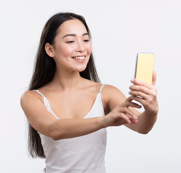 Beautiful woman taking slefies