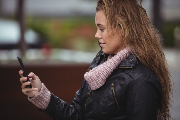 Beautiful woman using mobile phone