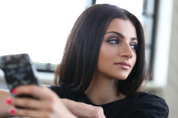 Beautiful woman using smartphone