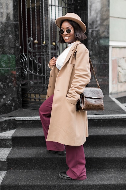 Free Photo | Beautiful woman wearing formal clothes outside