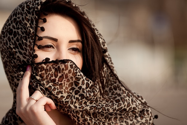 beautiful woman wearing a headscarf